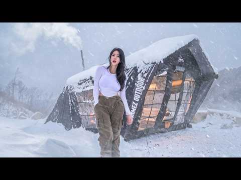 ❄️CAMPING IN A SNOWSTORM WITH A GIANT INFLATABLE TENT thumbnail