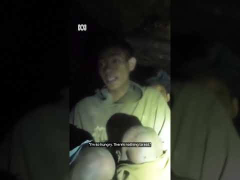 The moment rescuers reach five people trapped in Laos cave | ABC NEWS thumbnail
