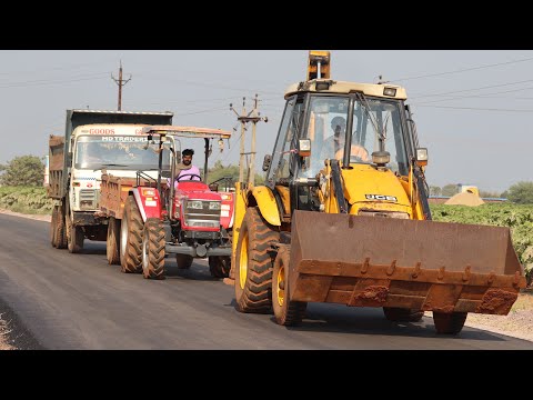 Kirloskar JCB 3dx Backhoe Loading Mud in  Mahindra Tractor Trolly and Tata 2518 Truck thumbnail