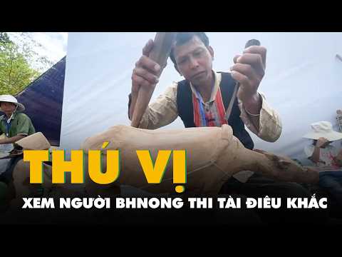 Xem người Bhnong thi tài điêu khắc tượng gỗ tại lễ hội truyền thống thumbnail