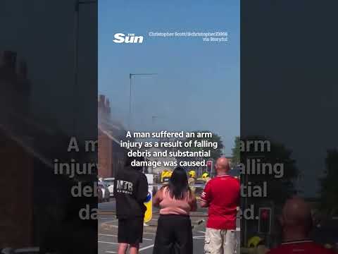 Man launches tiles at police in standoff over roof fire thumbnail