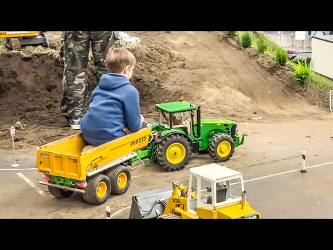 TRACTORS AND RC TRUCKS IN ACTION ON A HUGE PLAYGROUND thumbnail