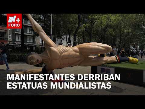Manifestantes vandalizan estatuas monumentales de futbolistas en Paseo de la Reforma thumbnail