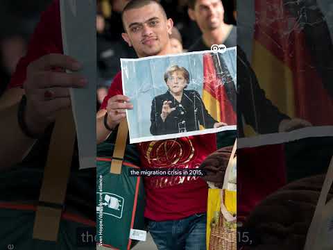 Former German Chancellor Angela Merkel awarded with European Order of Merit | DW News thumbnail
