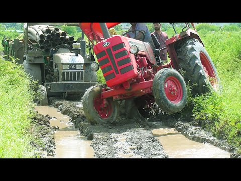 Eicher 485 Tractor Stuck in with Loaded Trolley Pulling New Holland 3630 and Mahindra 275 Di XP plus thumbnail