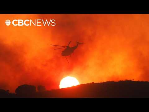 California wildfires threaten homes northwest of L.A. thumbnail