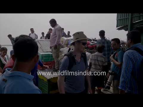 Crowded ferry ghat on the Brahmaputra River in Assam thumbnail