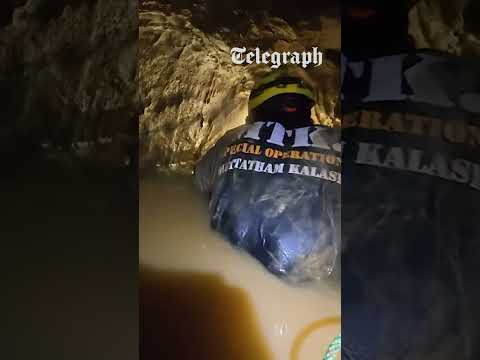 Divers crawl through flooded caves in attempt to rescue seven trapped thumbnail