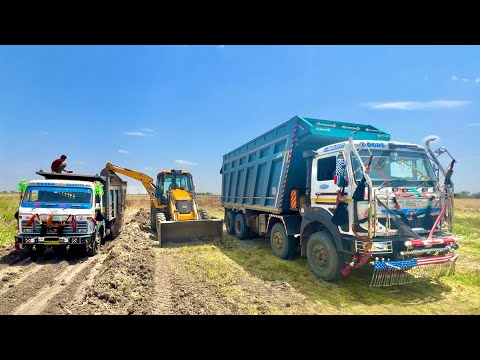 JCB 3dx Loading Mud in TATA 3525 Tipper TATA 2518 Mahindra NOVO 605 tractor DI 4x4 dump track thumbnail