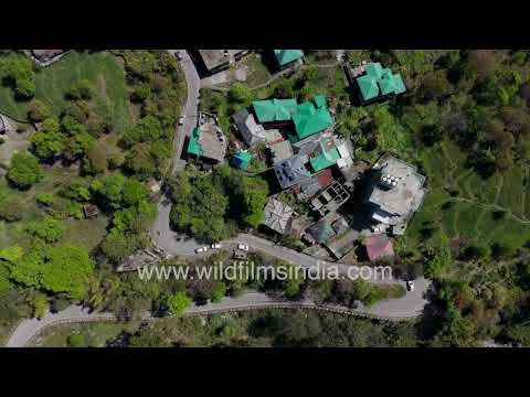 Dharamshala town and the majestic Dhauladhar Mountains of Himachal Pradesh thumbnail