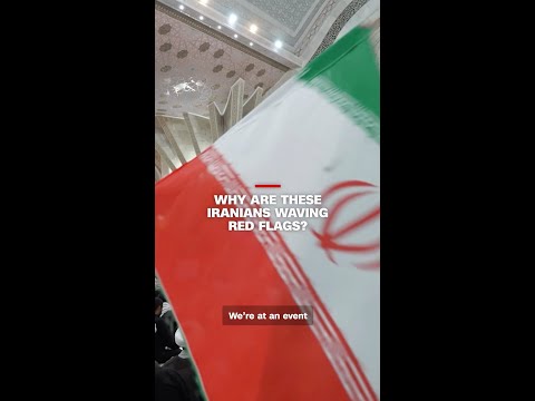 Why are these Iranians waving red flags? thumbnail