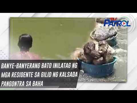 Banye-banyerang bato inilatag ng mga residente sa gilid ng kalsada pangontra sa baha | TV Patrol thumbnail