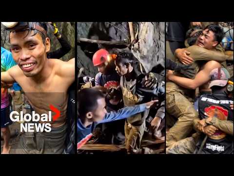 The moment men trapped in a flooded Laos cave emerge after 10 days thumbnail