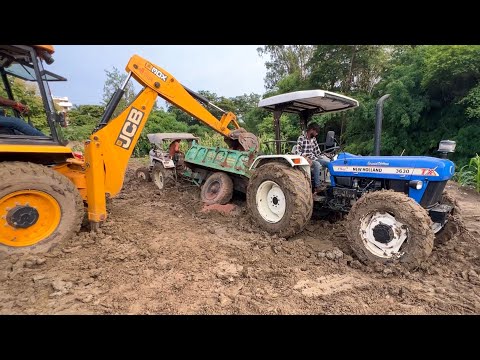 Eicher 242 Stuck | New Holland 3630 | Mahindra NOVO | JCB 3dx Loading Sand & 40mm Stones in Trolley thumbnail