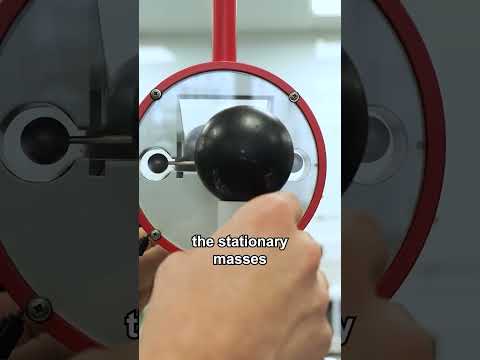 Watch gravity bring these two balls together in real time thumbnail