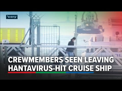 Crew of hantavirus-hit ship seen with luggage ahead of quarantine in Rotterdam | ABS-CBN News thumbnail