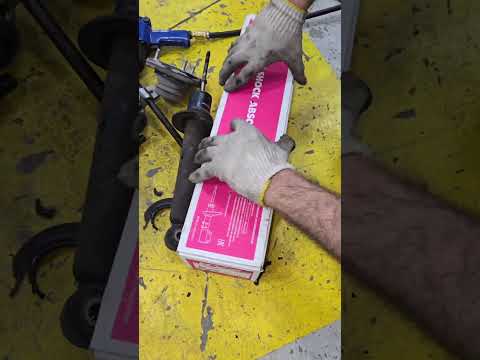 Mitsubishi front shock absorber changing #automotive #DIY #garage #mechanic thumbnail