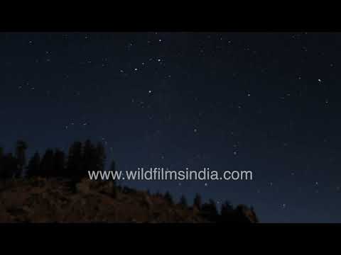 Timelapse of Nanda Devi Under a star-filled Himalayan sky thumbnail