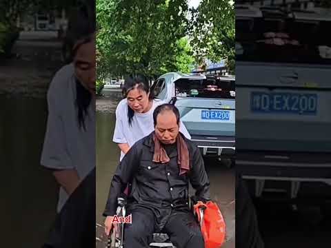 The wheelchair got stuck... but the woman's kindness kept moving. #short,#kindness,#help,#love thumbnail
