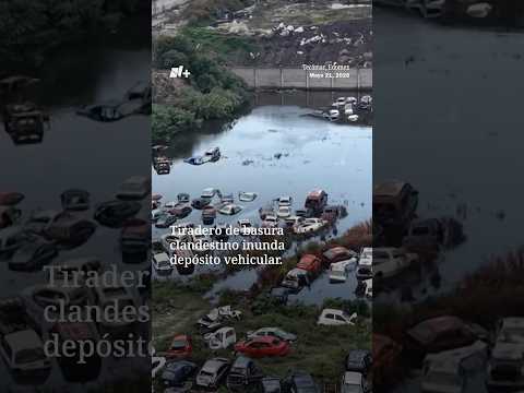 Tiradero clandestino inunda depósito vehicular y arruina decenas de coches en Tecámac | N+ thumbnail