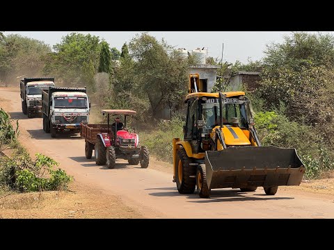 JCB 3dx Loading Mud in Mahindra Tractor and Tata 2518 Truck For Making Farming Land thumbnail